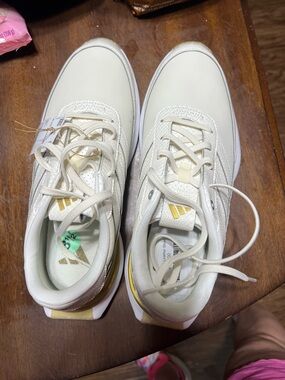 adidas Off-White Sneakers with Gold Accents